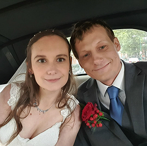 Lauren and Josh in the wedding car